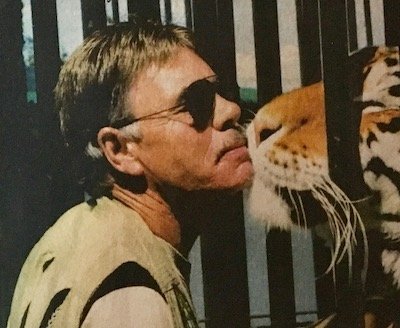 Founder Billy with a tiger.